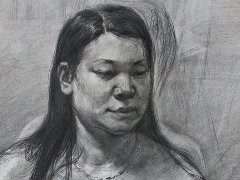 女青年半身坐像